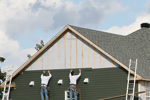 Professional Siding technician working in Auburn, KY